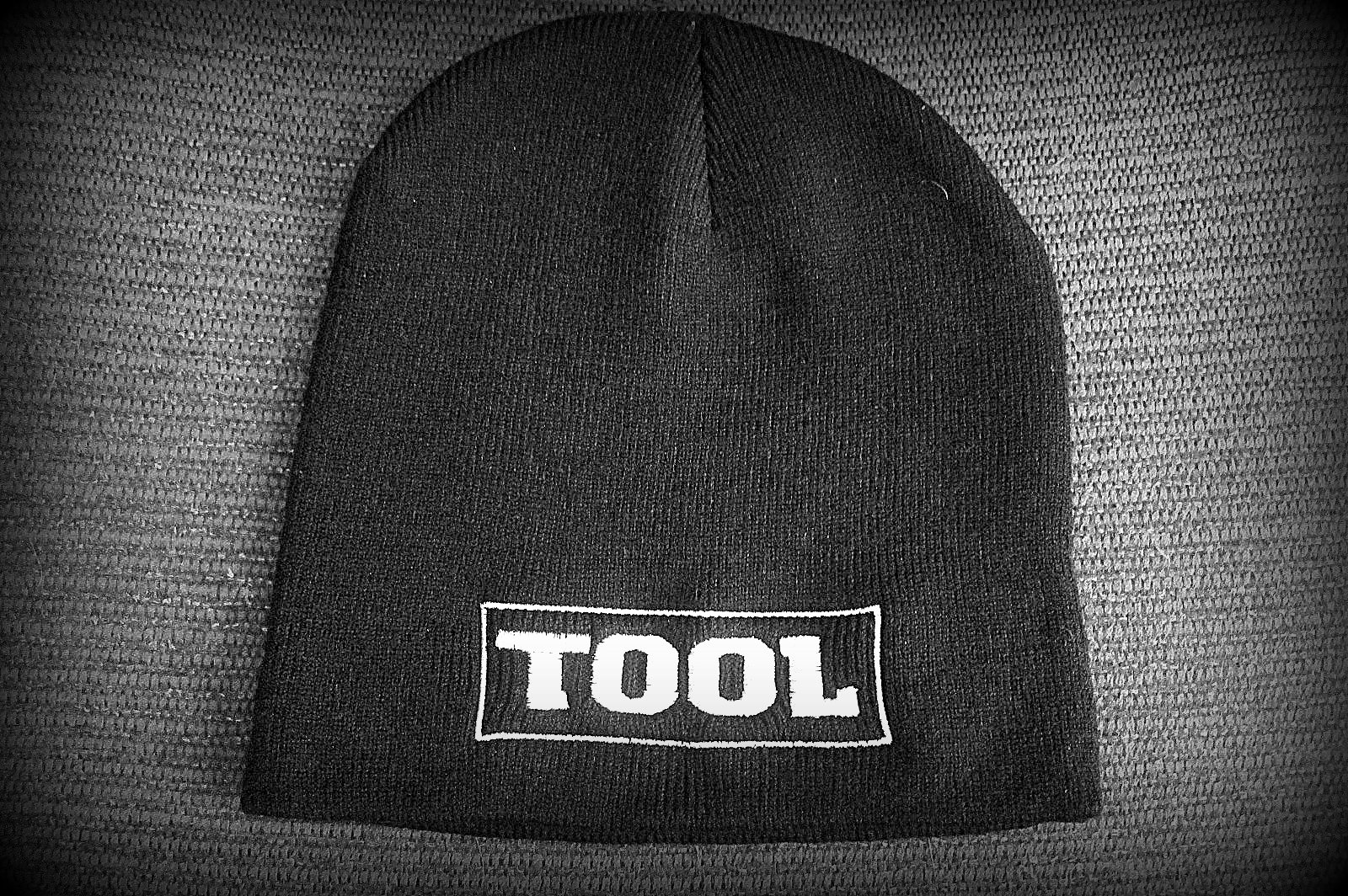 TOOL-Embroidered - Logo Beanie - Stretchy 100% acrylic fabric provides a one-size-fits-all . Soft and light-weight beanie with slightly ribbed knit texture