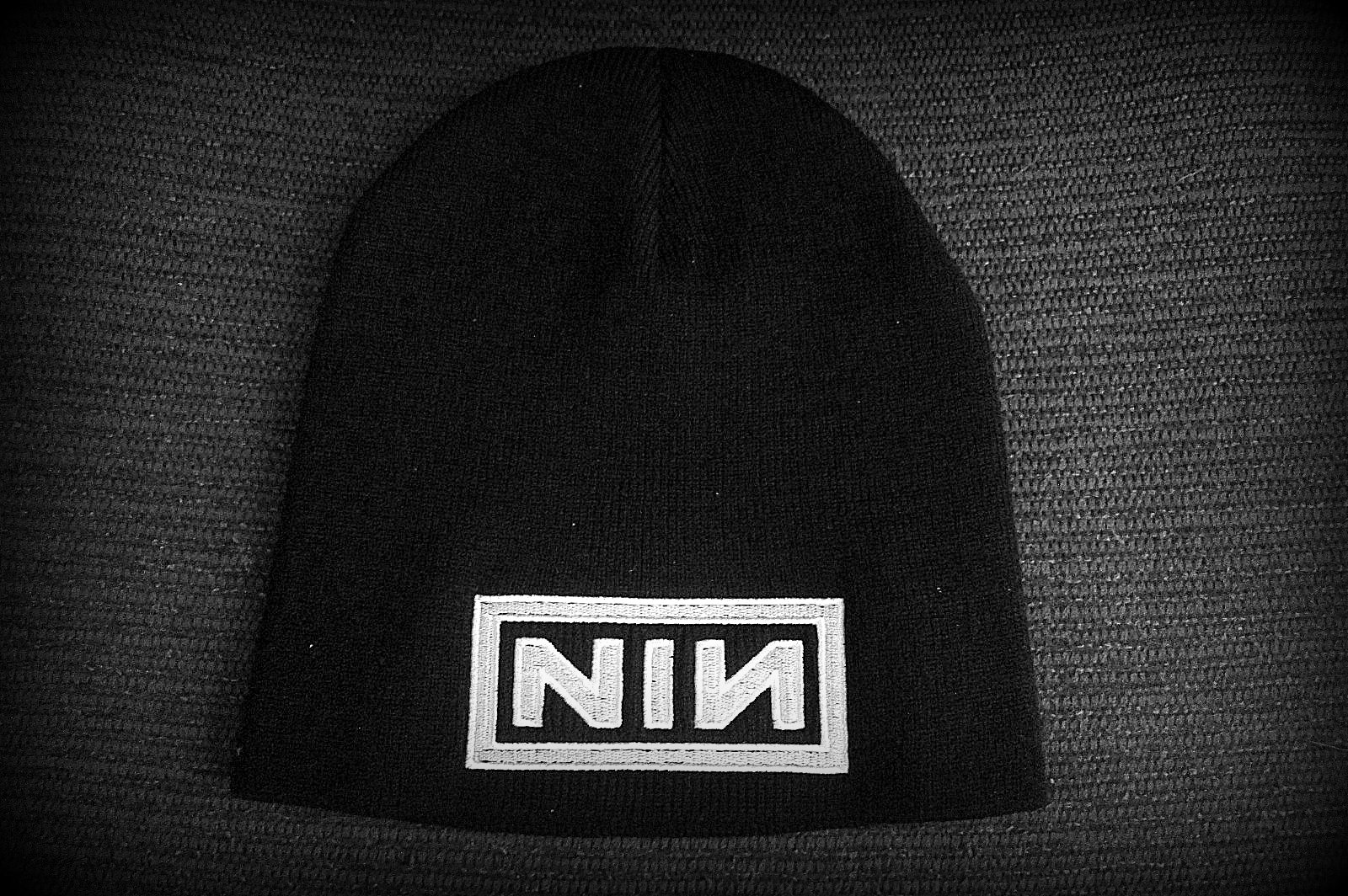NINE INCH NAILS - -Embroidered - Logo - Stretchy 100% acrylic fabric provides a one-size-fits-all . Soft and light-weight beanie with slightly ribbed knit texture
